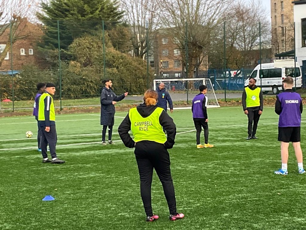 Budding Football Coaches receive training on the pitch