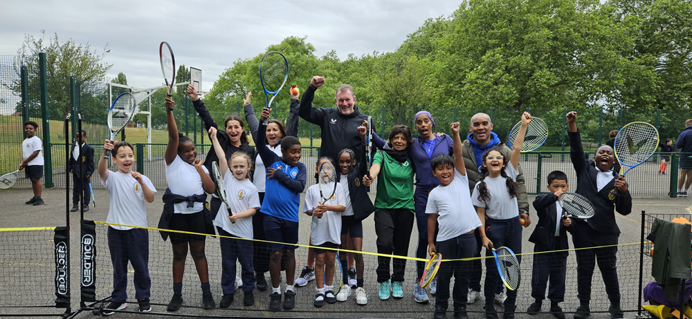 Dave Beasant and Mark Stein with young tennis players