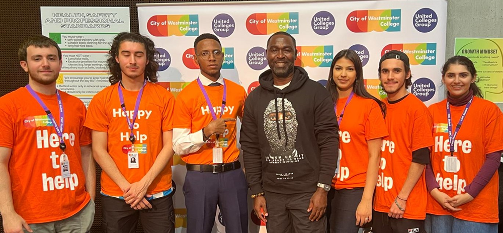 Footballing legend Andy Cole with students from Westminster Uni